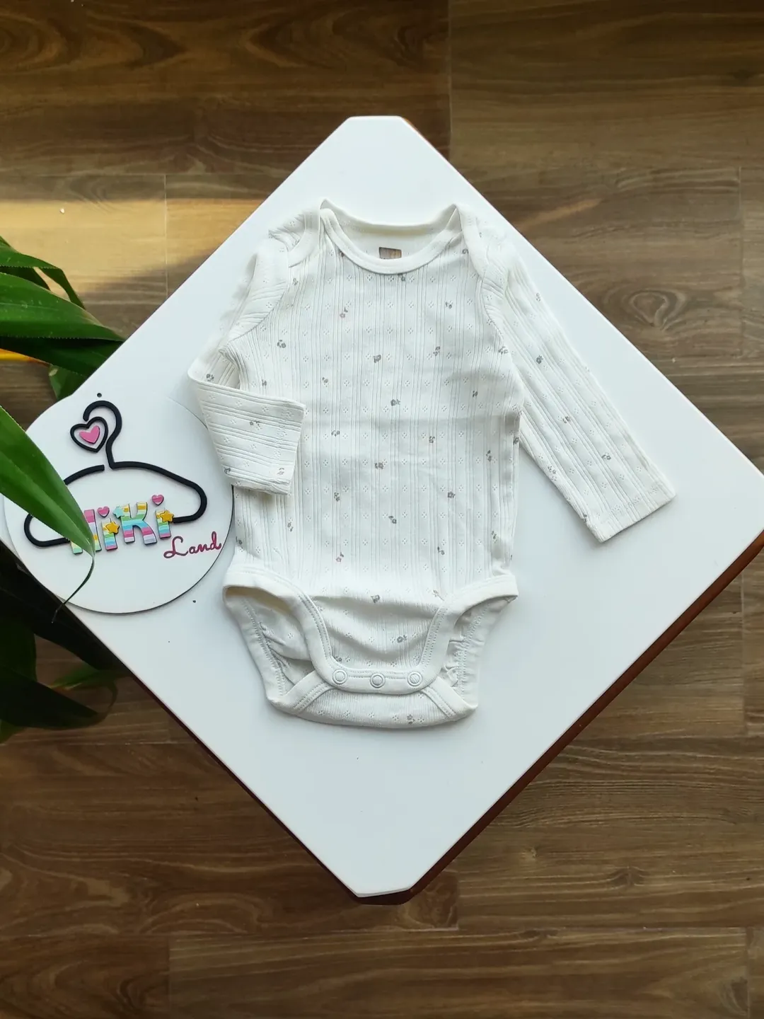 بادی بچگانه وارداتی آستین بلند h&m سفید گلدار کد ۲۴۶