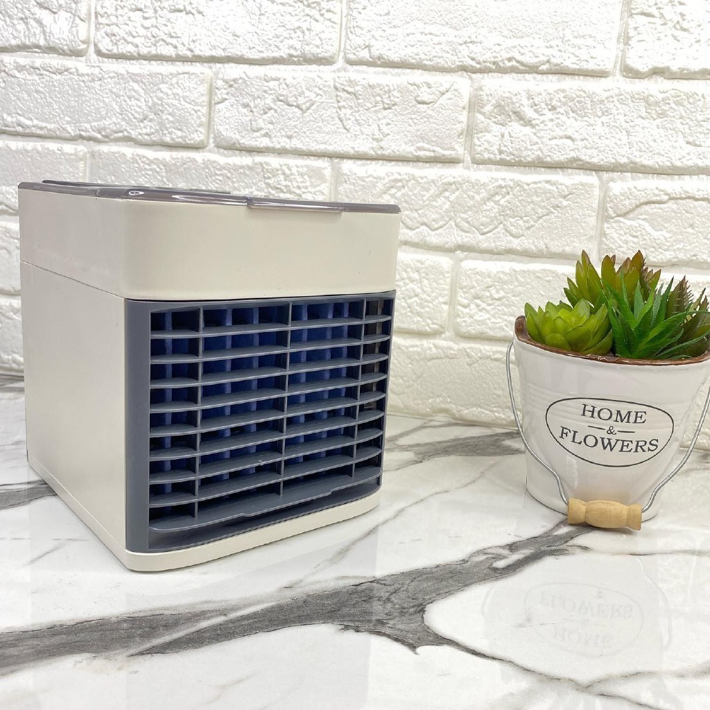نمای جانبی و طراحی ظاهری مینی کولر آرکتیک پنجره ثابت، فن بزرگ با رنگ‌بندی جذاب