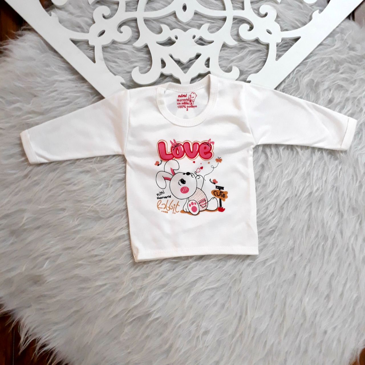 جزئیات کیفیت ساخت و متریال به‌کاررفته در بلوز لباس نوزادی سایز ۱ تا ۳ پنبه اعلا طرح لاو صورتی