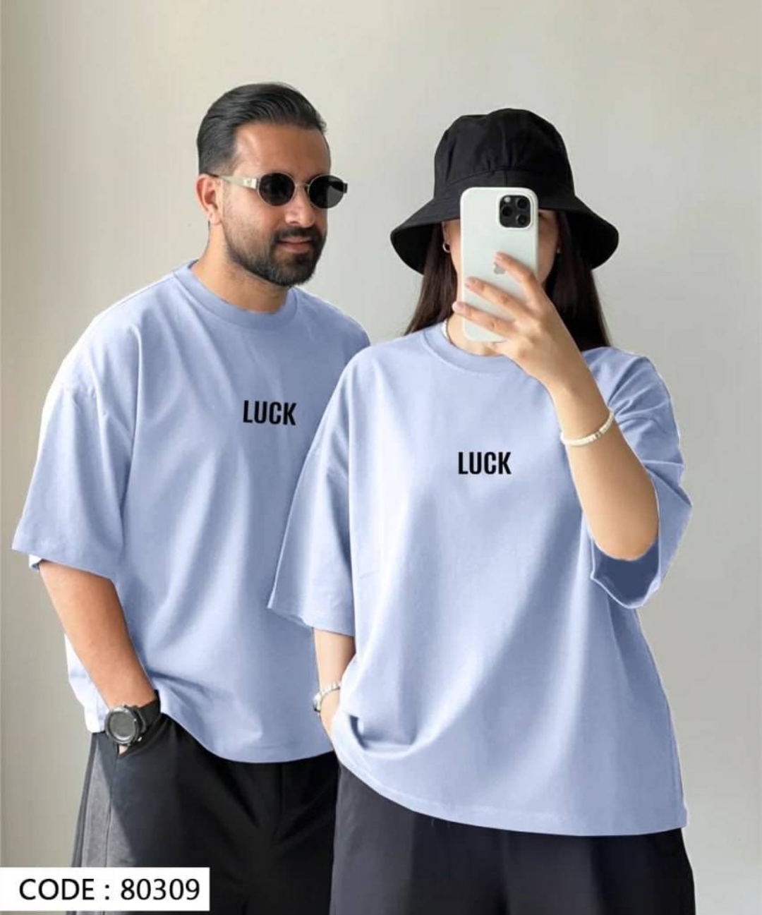 نمای کامل تیشرت باکسی LUCK کاپلی همراه با بستهبندی اصلی و جزئیات محصول
